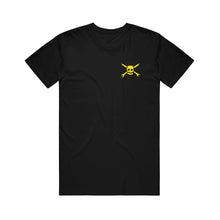 Load image into Gallery viewer, Image of the front of a black tshirt against a white background. The left chest of the shirt features the teenage bottle rocket logo in yellow- a skull head with cross arrows. 
