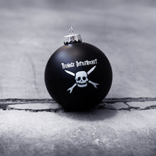 Load image into Gallery viewer, image of a black ball christmas ornament on a cracked, concrete floor. ornament has white print of a skull and the words teenage bottlerocket at the top.
